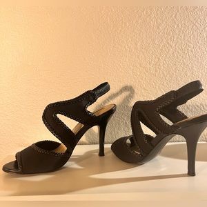 Straps fabric shoe with leather sole; cute design on edge, excellent condition.